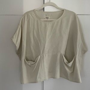 cream Jamie+The Jones raw silk top with roomy pockets 🤍